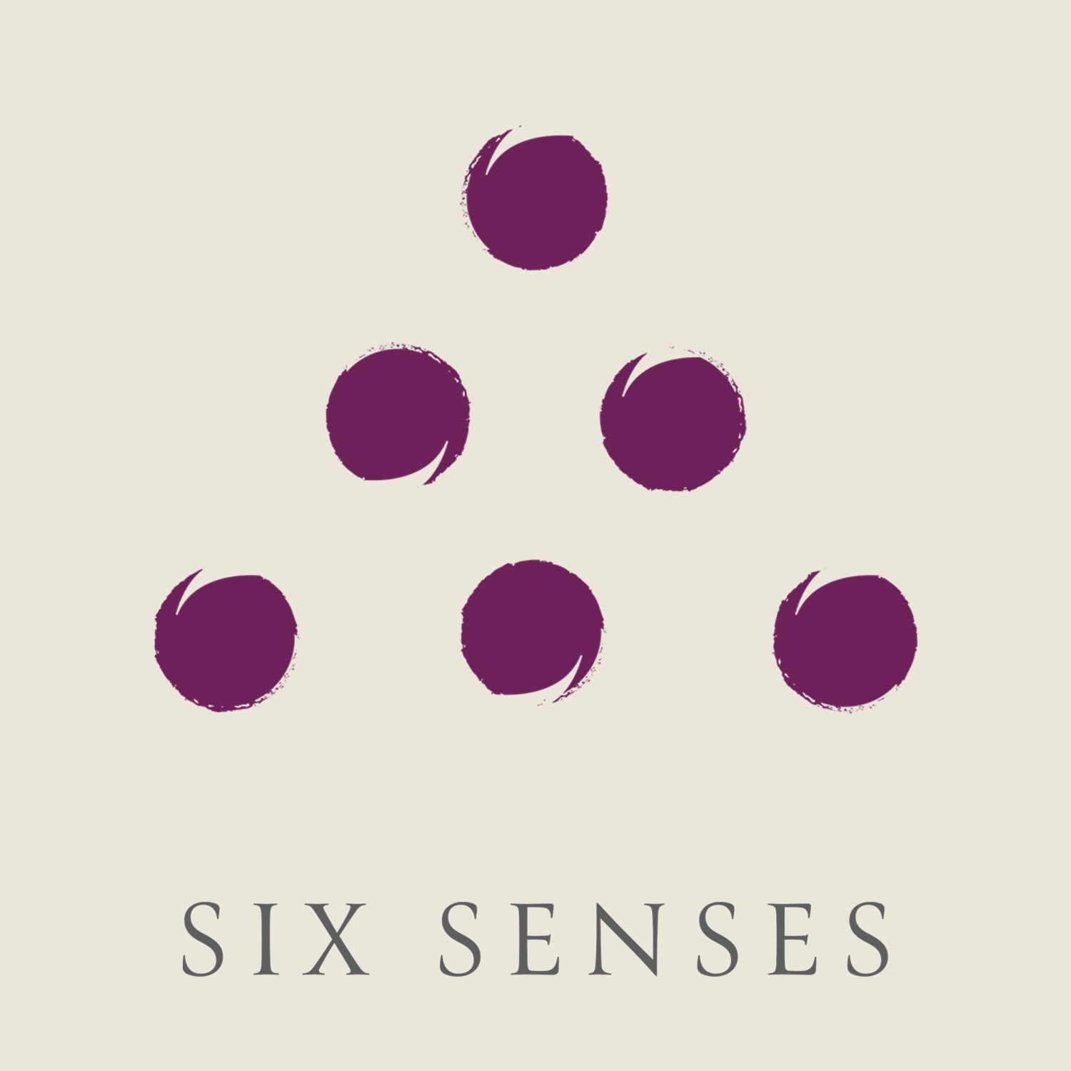 Six Senses mark, six purple dots